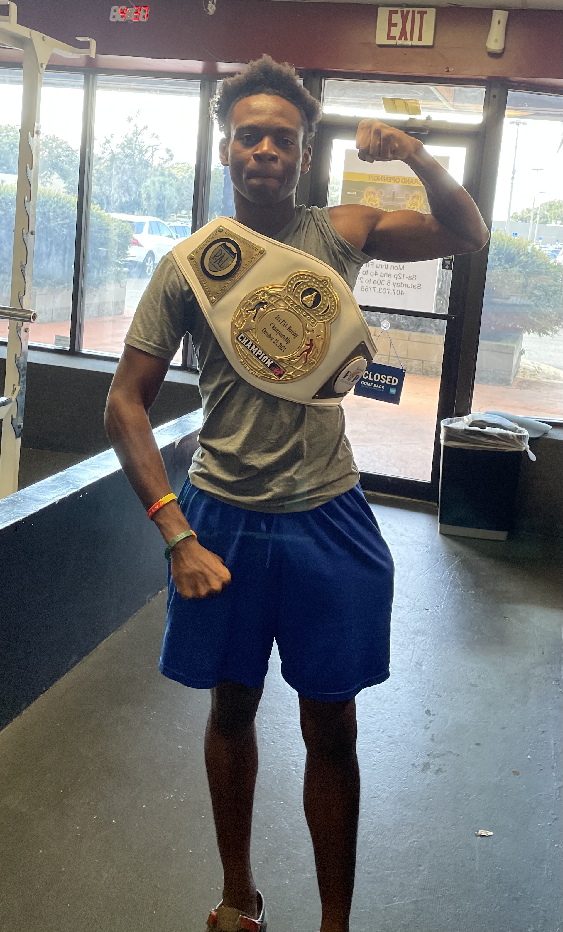 Coach Cruz with championship belt